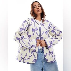 ASOS DESIGN cotton quilted jacket in bow print